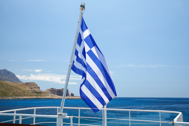 Greek flag on a pleasure boat - Фото, изображение