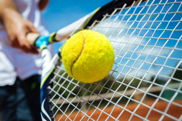 Tennis player playing a match - Fotó, kép