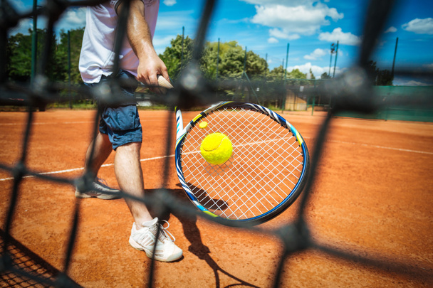 Tennis player playing a match - Foto, Bild