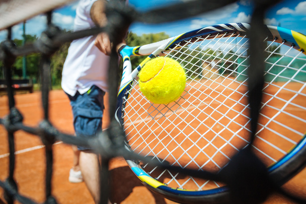 Tennis player playing a match - Foto, Imagem