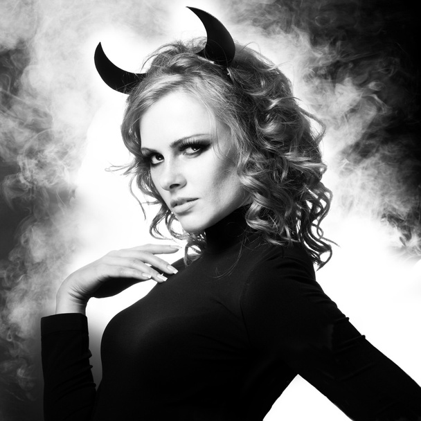 The beautiful young girl a devil - Foto, Imagem