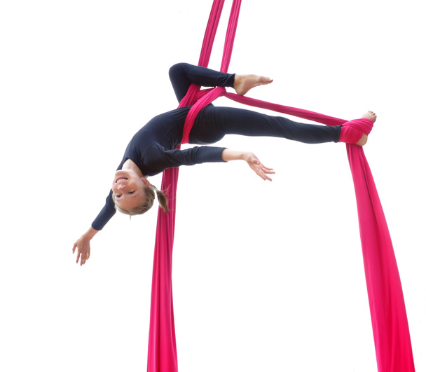 cheerful child training on aerial silks - Фото, изображение
