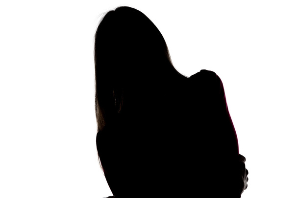 Silhueta de mulher com cabeça inclinada
  - Foto, Imagem