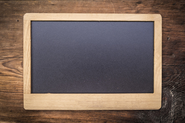 Chalkboard em fundo de textura de madeira velha
 - Foto, Imagem
