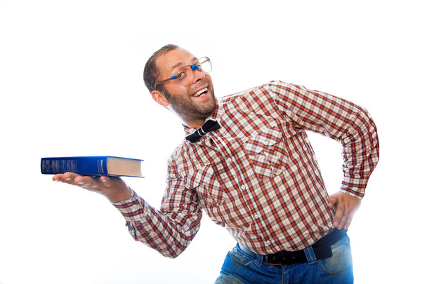 adult male hipster presents a book and smiling - 写真・画像