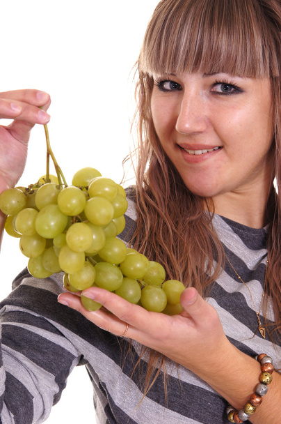 Girl and grapes - Foto, afbeelding