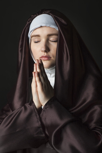 Young attractive nun. - Фото, изображение
