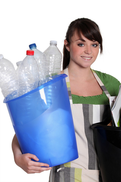 Teenager taking out the recycling - 写真・画像