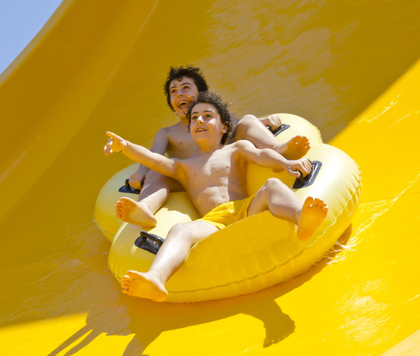 The  boys are have fun in the water park - Φωτογραφία, εικόνα
