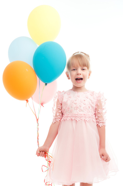 Nice little girl holding balloon  - Foto, imagen