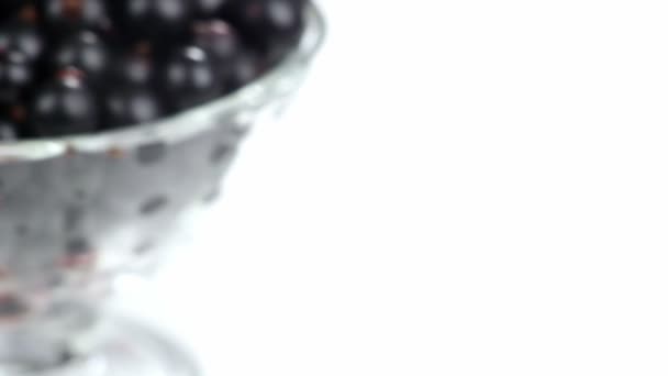 Grosellas negras en un vaso
 - Imágenes, Vídeo