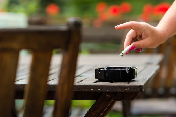 Ashtray with cigarette - Фото, зображення
