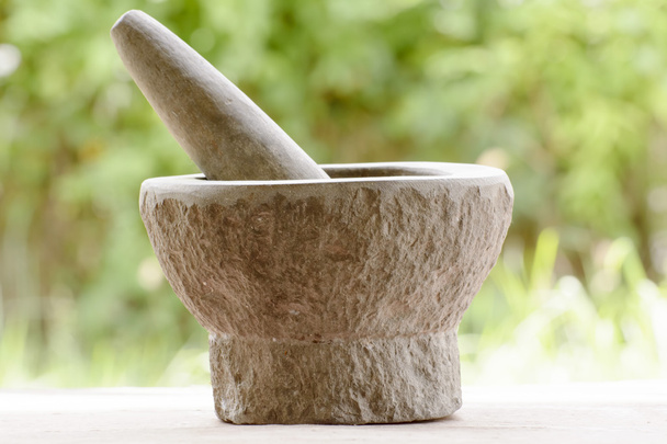 Pestle and mortar made of stone - Foto, afbeelding
