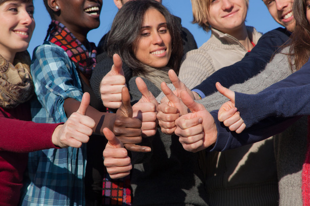 Happy College Students with Thumbs Up - Foto, Bild