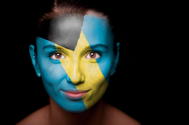 Portrait of a woman with the flag of the Bahamas - Foto, Bild