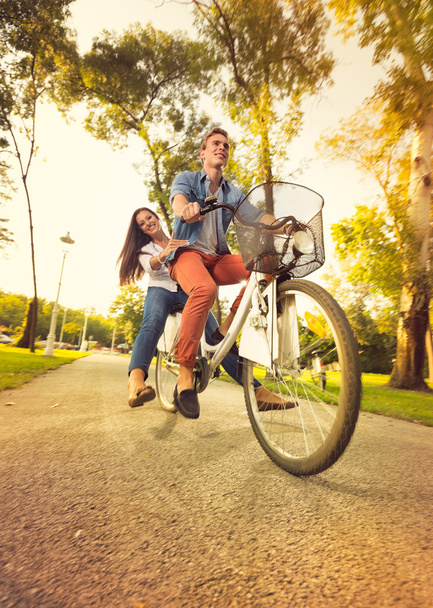Couple on bike - Foto, afbeelding