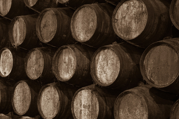 Barrels in the wine cellar - Photo, Image