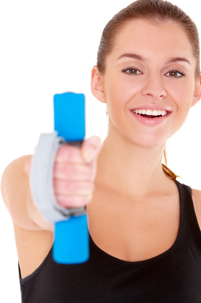 Portrait of fitness woman working out with free weights - Zdjęcie, obraz