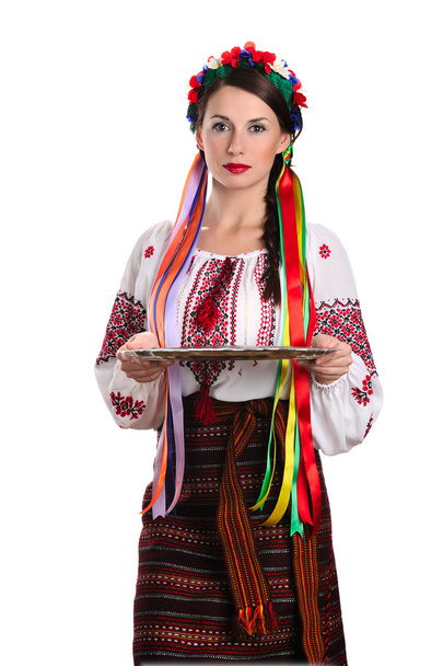 Woman in ukraininan costume holding empty tray - Фото, зображення