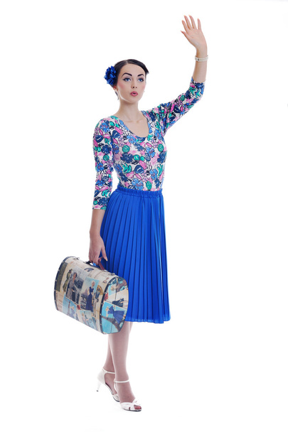 Pinup retro woman with travel bag isolated - 写真・画像
