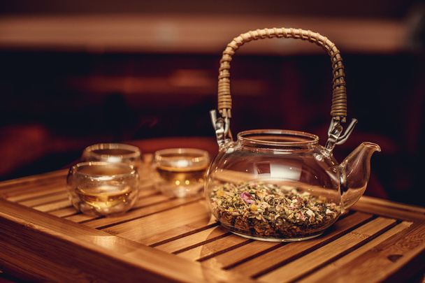 Glass chinese teapot with herbs - Fotografie, Obrázek