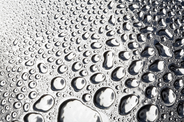 Water drops on polished metal surface - Photo, image