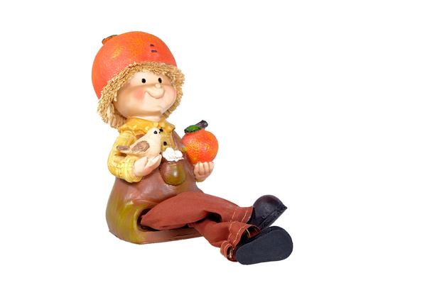 Petit bébé avec figurine en céramique orange
 - Photo, image