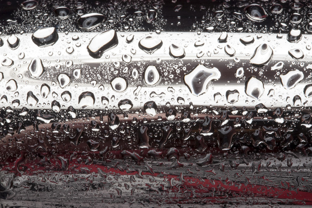 Water drops on polished metal surface - Photo, Image