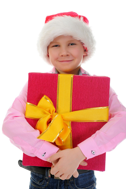 Cheerful boy in Santa Claus hat - Valokuva, kuva