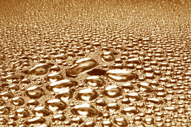Капли воды на поверхности полированного металла
 - Фото, изображение