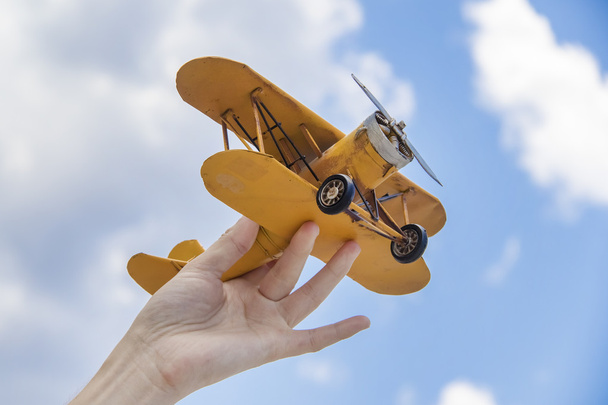 Yellow, retro airplane model - Photo, image
