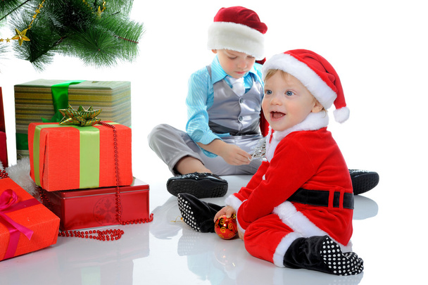 Cheerful boy in Santa Claus hat - Фото, изображение