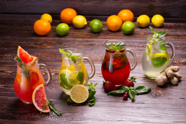 Summer drinks with ice,  berries and citrus fruits. - Photo, Image