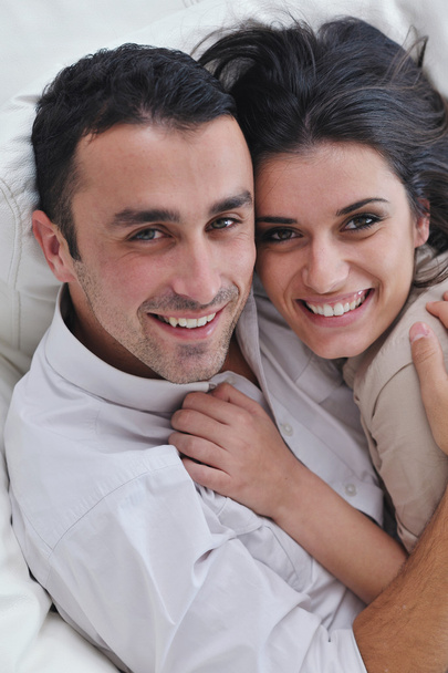 Happy young couple relax at home - Фото, зображення