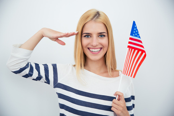 Mujer patriótica sosteniendo bandera de EE.UU.
 - Foto, imagen