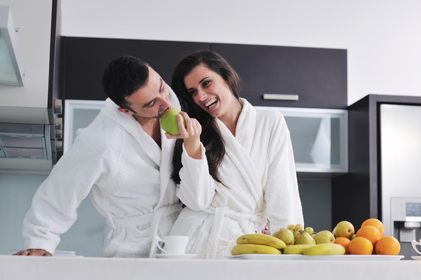 Young couple have fun in modern kitchen - Valokuva, kuva