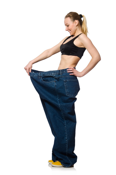 Dieting concept with big jeans - Foto, afbeelding