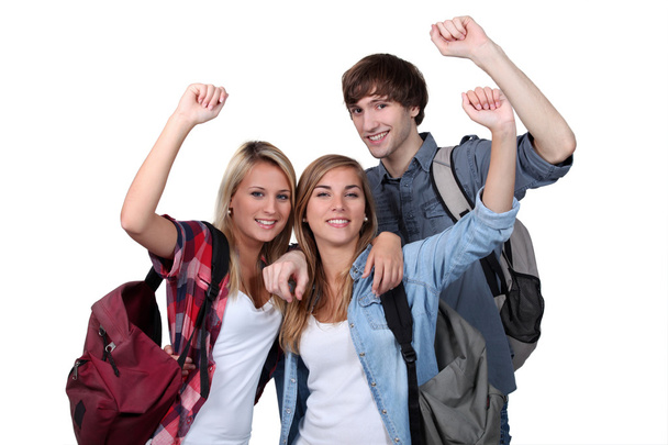 Students with arms up - Foto, Imagen