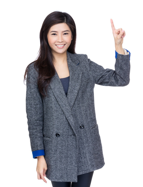 Joven asiática mujer en gris abrigo
 - Foto, Imagen