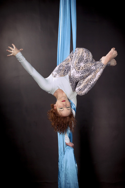 Young woman doing exercise on aerial silk - Φωτογραφία, εικόνα