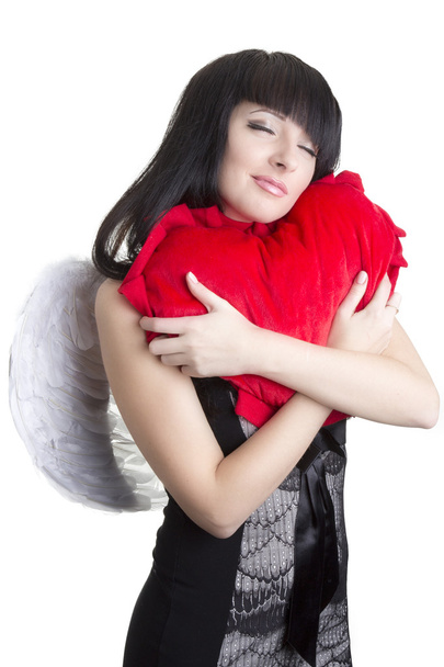 Красива жінка ангела, що обіймає червоне серце
 - Фото, зображення