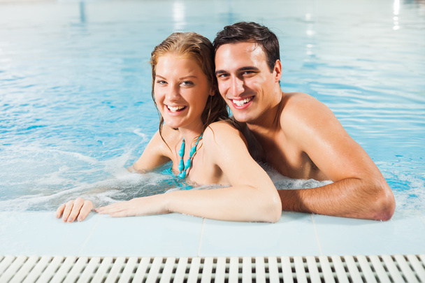 Couple at pool - Foto, afbeelding