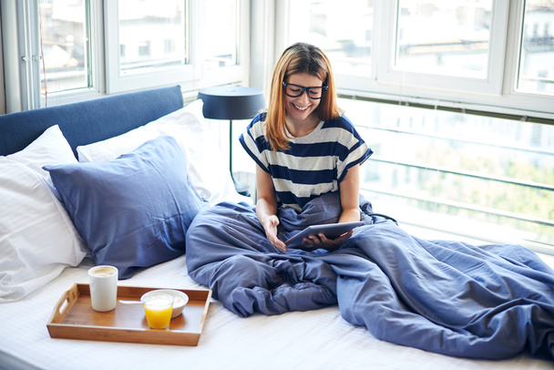 Breakfast in bed for woman with glasses - Photo, image