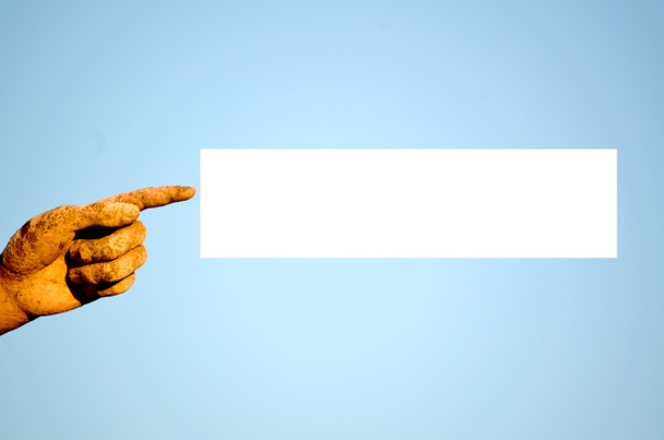 Палец с прямоугольной белой этикеткой
 - Фото, изображение