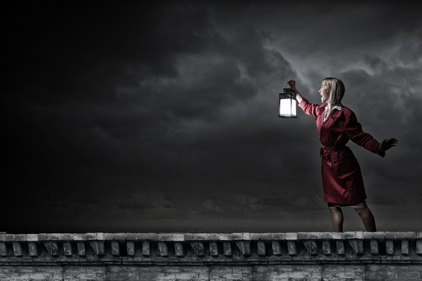 Woman with lantern - Foto, Bild
