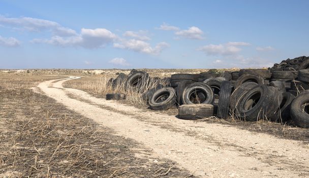 Used Tires in a  Recycling Yard - Фото, изображение