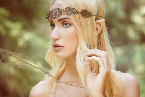 fantasy beautiful elf girl in woods - Fotoğraf, Görsel