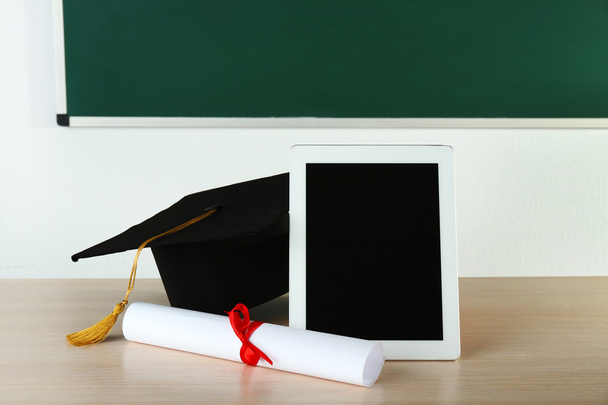 Graduation cap with tablet and diploma - Φωτογραφία, εικόνα