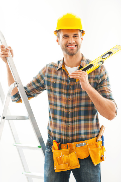 manual worker holding hand on ladder - Zdjęcie, obraz