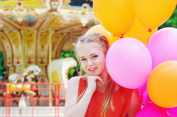 Young model woman smiling with colorful balloons - Φωτογραφία, εικόνα